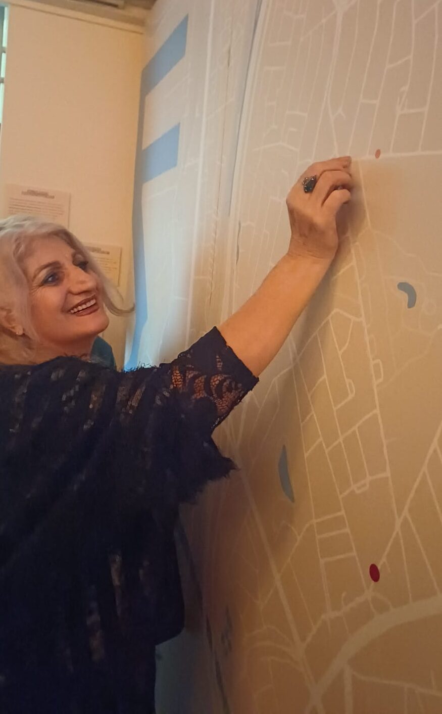 Community members placing stickers on the participatory noise map